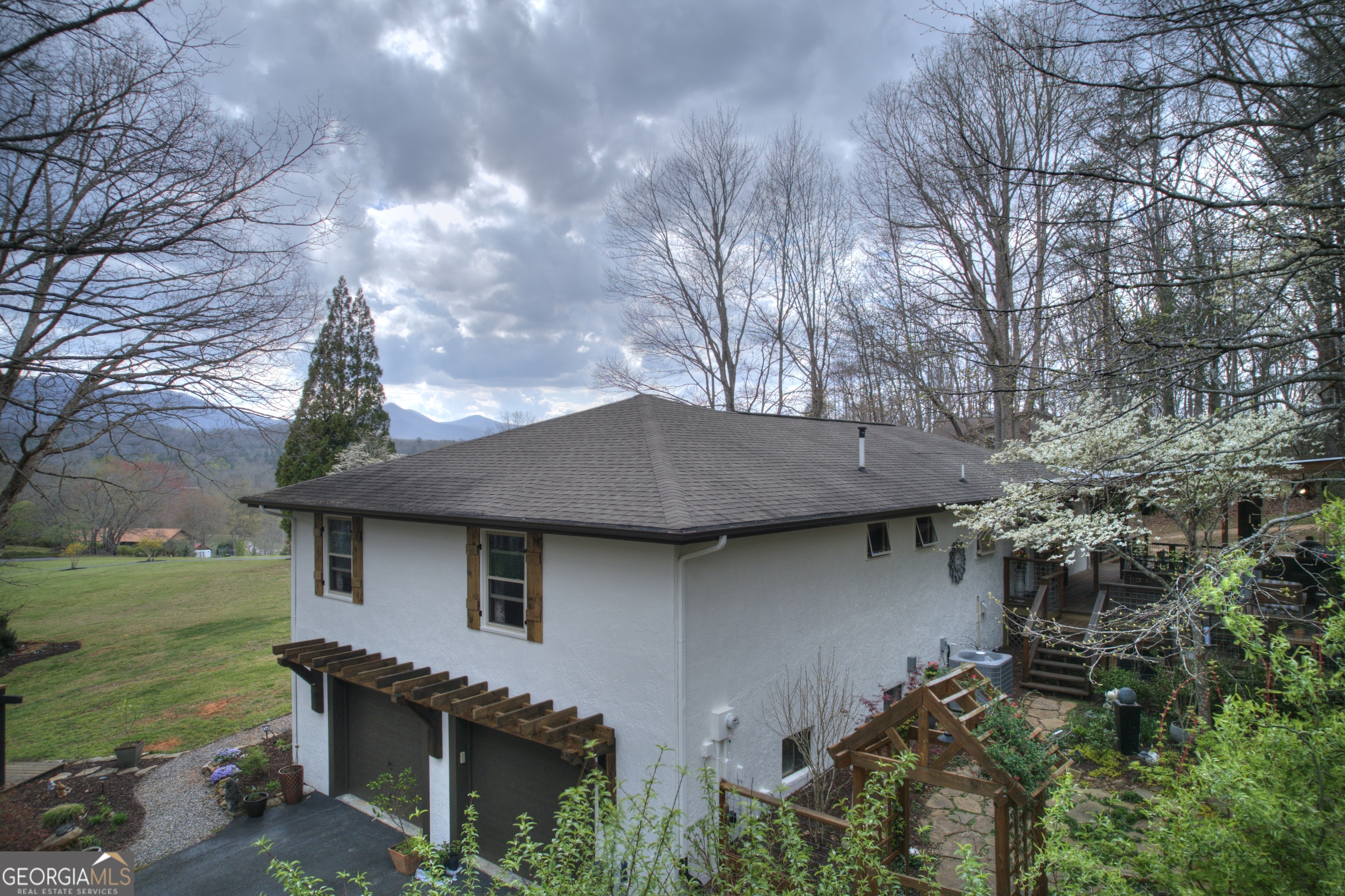 199 Oak Ridge Drive Blairsville, GA 30512 - Photo 23 of 107 a view of a house with a yard