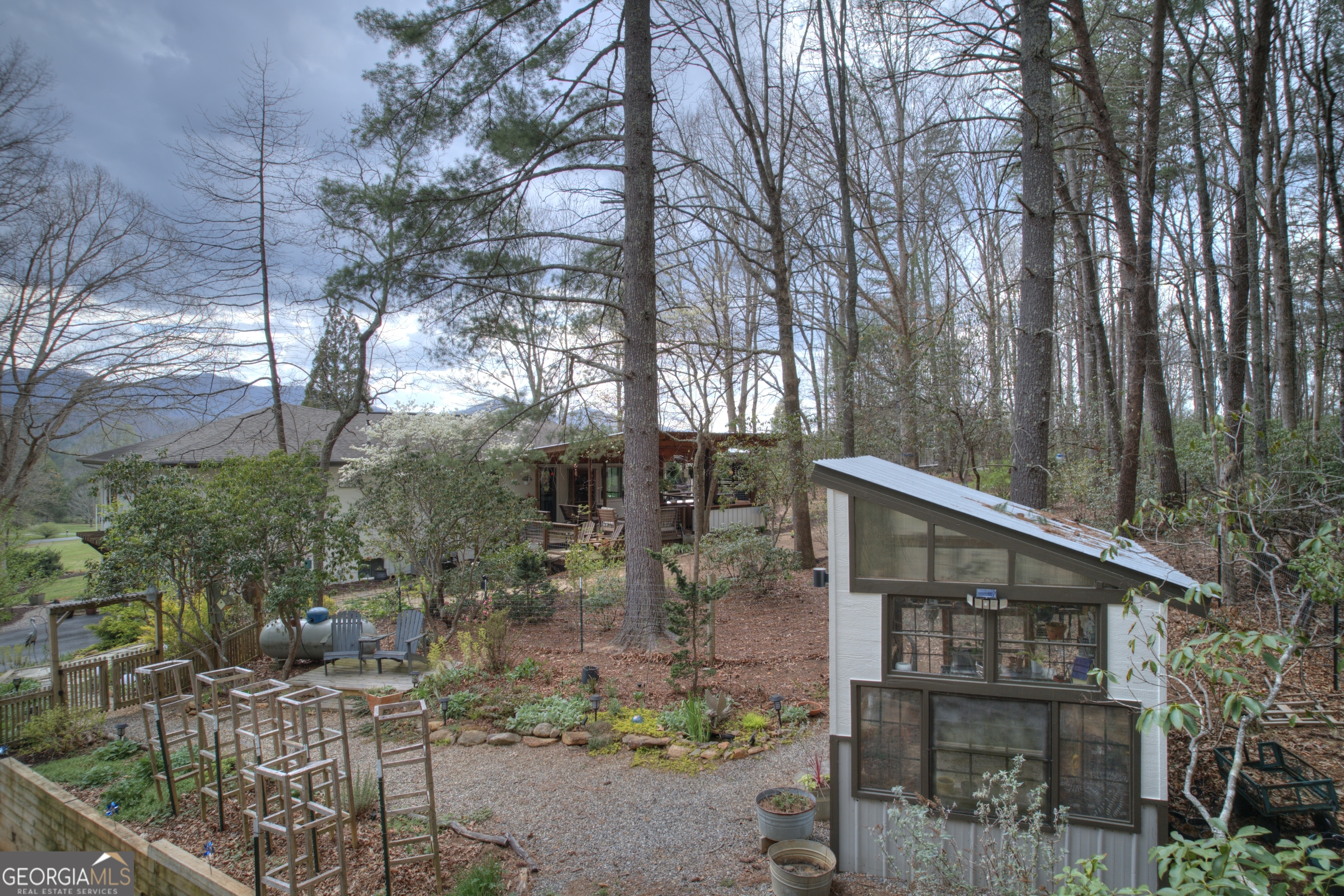 199 Oak Ridge Drive Blairsville, GA 30512 - Photo 29 of 107 a view of house with outdoor space and sitting area