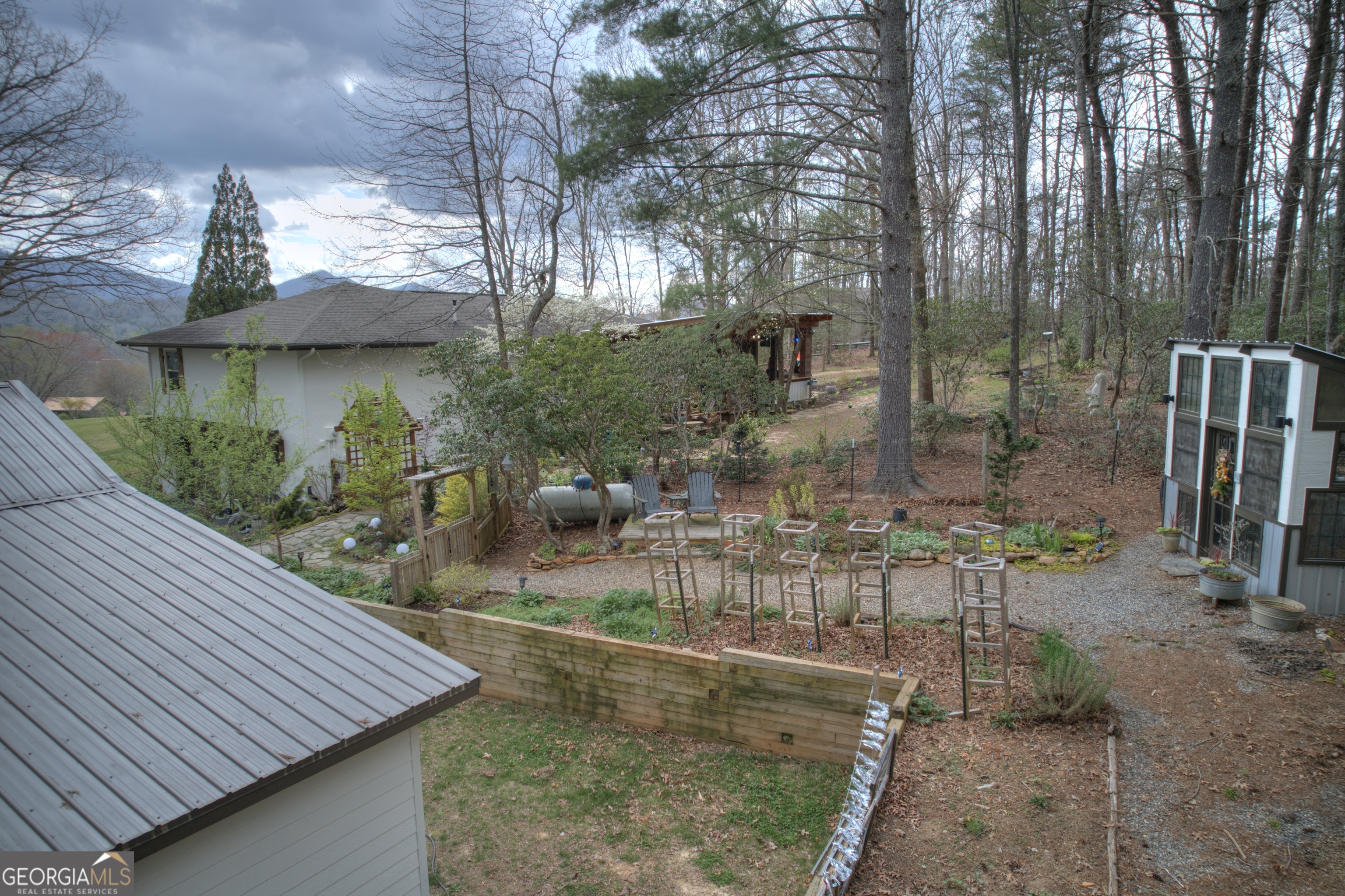 199 Oak Ridge Drive Blairsville, GA 30512 - Photo 30 of 107 a view of a backyard with sitting area and furniture