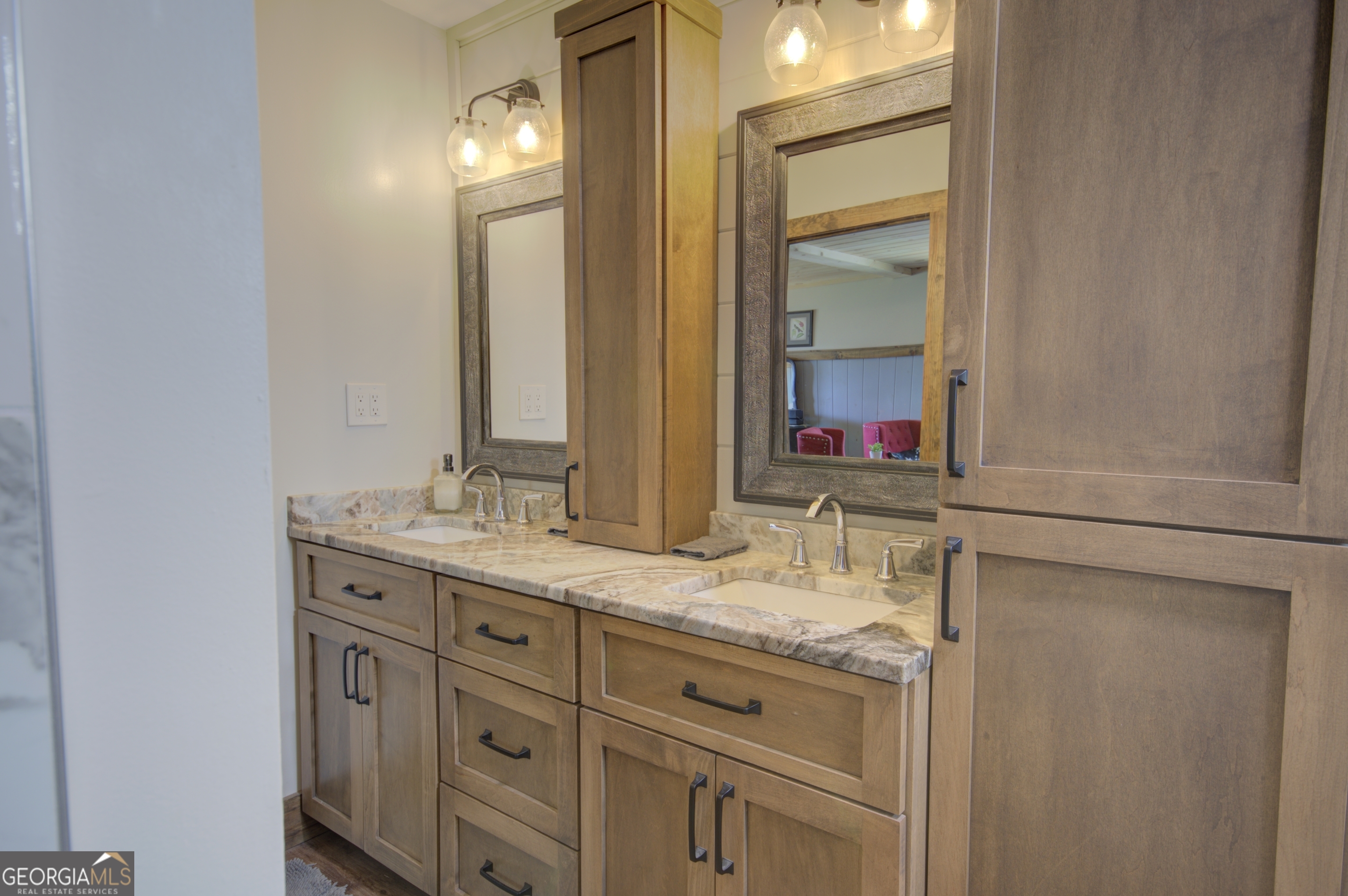 199 Oak Ridge Drive Blairsville, GA 30512 - Photo 85 of 107 a bathroom with a granite countertop sink and a mirror