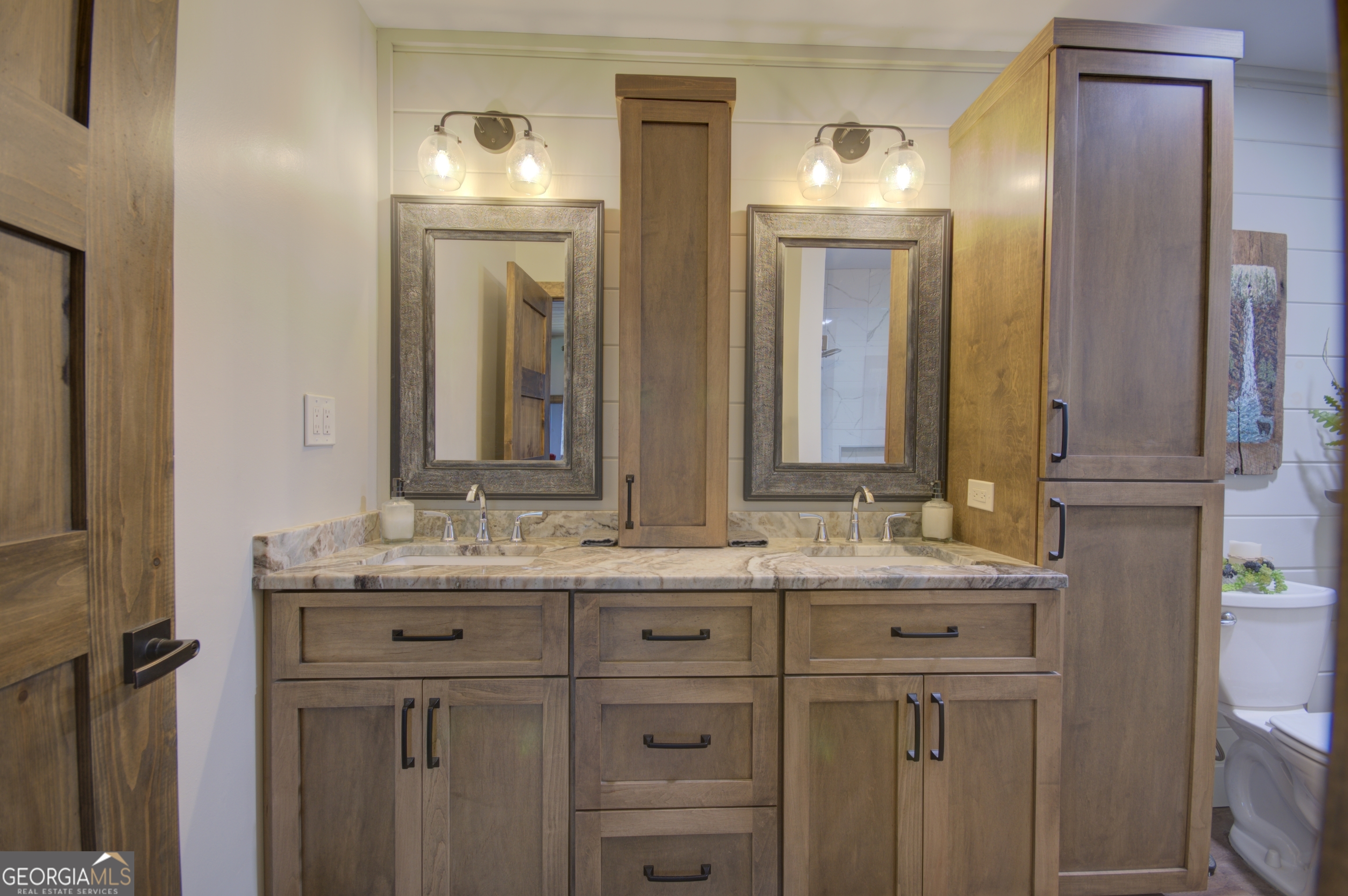 199 Oak Ridge Drive Blairsville, GA 30512 - Photo 86 of 107 a bathroom with a double vanity sink and a mirror