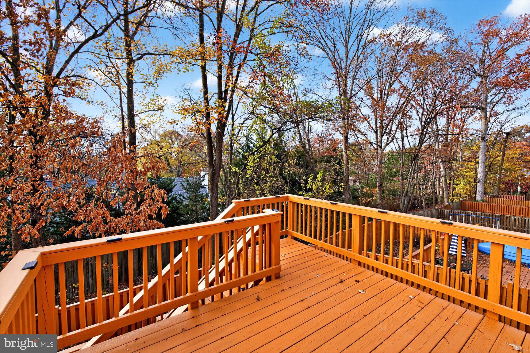 7310 Eggar Woods Lane Springfield, VA 22153 - Photo 13 of 29 a view of deck with a trees