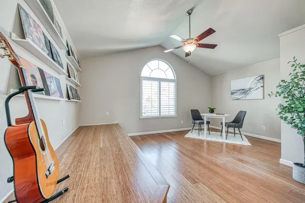 a bedroom with bed and window