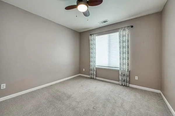 a bathroom with a double vanity sink mirror and