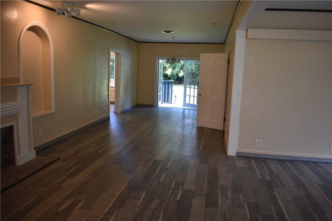 1991 Bacom Point Road Pahokee, FL 33476 - Photo 13 of 36 living room to formal DR