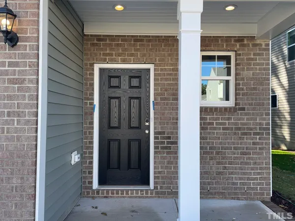a front view of a house with a window