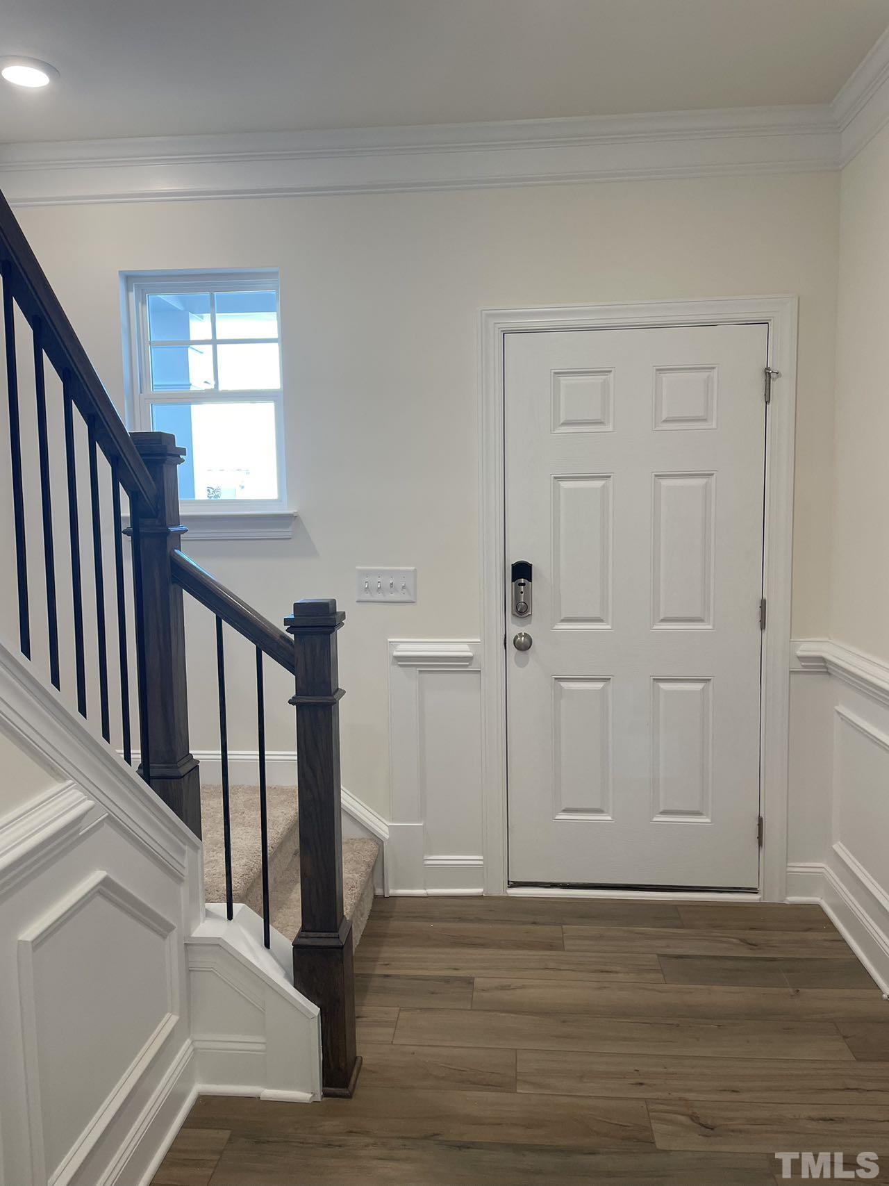 2205 Seneca Road Raleigh, NC 27604 - Photo 3 of 21 a view of entryway and hall with wooden floor