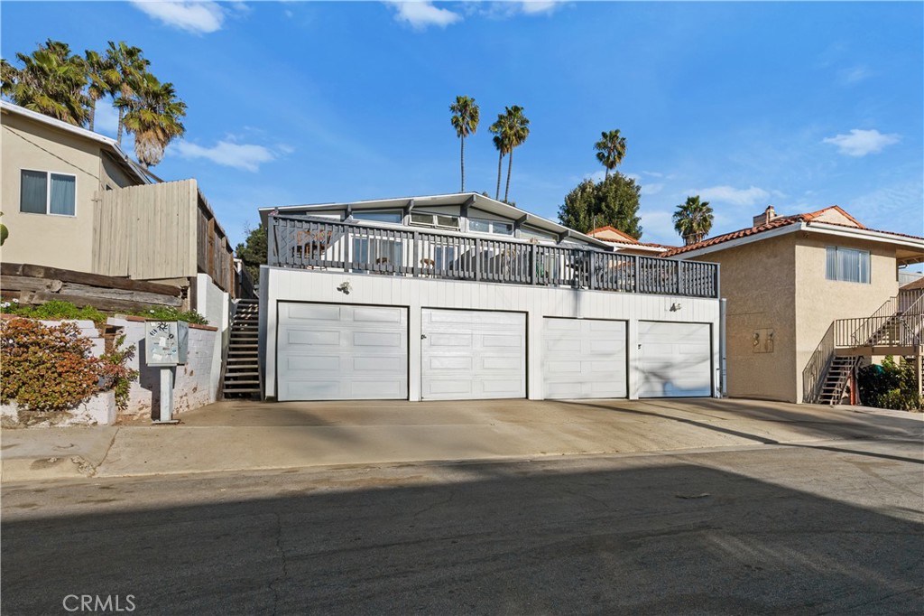 2603 Calle Del Comercio, Unit B San Clemente, CA 92672 - Photo 16 of 18 a view of a house with a garage