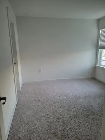 a view of a small space with a window