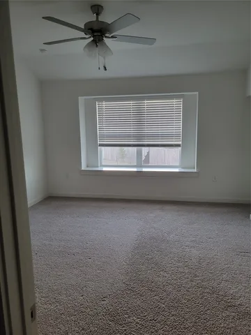 a large bathroom with a double vanity sink and a mirror
