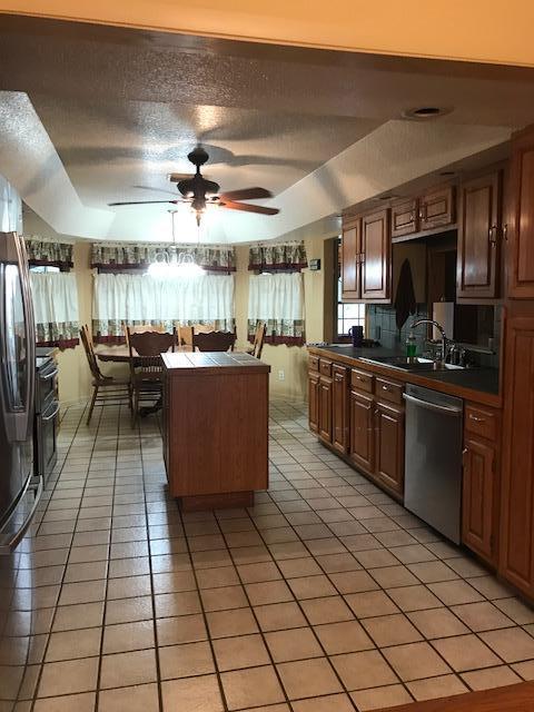 2245 Bacom Point Road Pahokee, FL 33476 - Photo 3 of 24 Back Lot Home Kitchen - Dining Room