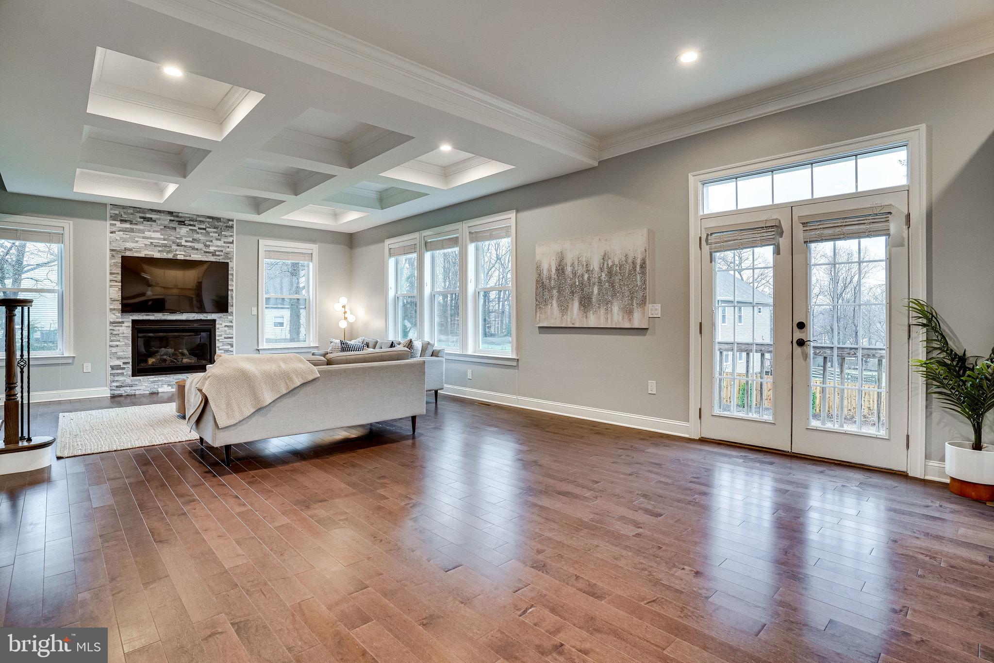 8733 Pohick Road Springfield, VA 22153 - Photo 14 of 40 Engineered hardwood flooring on main level