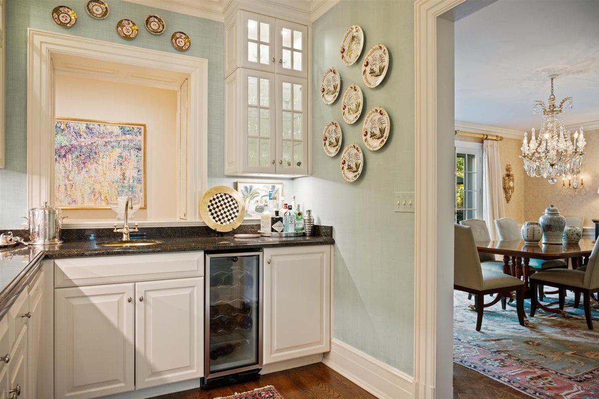 5 Woodley Road Winnetka, IL 60093 - Photo 18 of 48 a kitchen with granite countertop a sink and cabinets