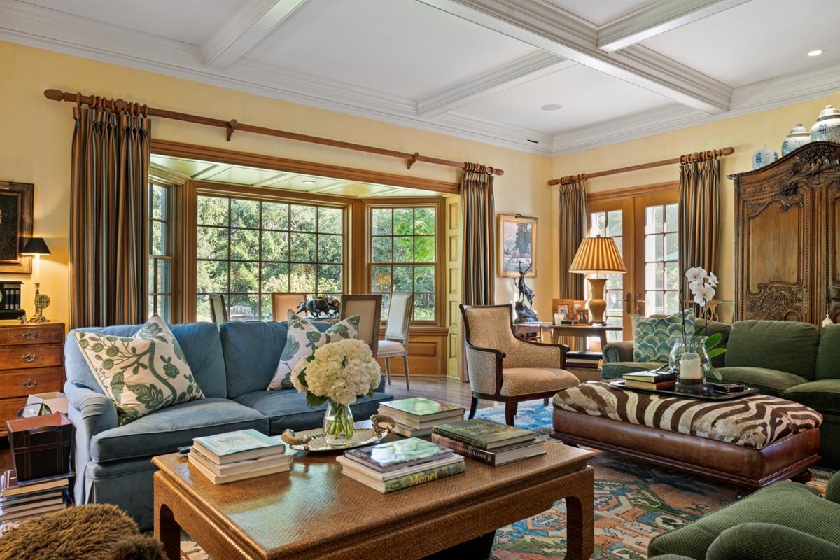 5 Woodley Road Winnetka, IL 60093 - Photo 22 of 48 a living room with furniture and floor to ceiling windows