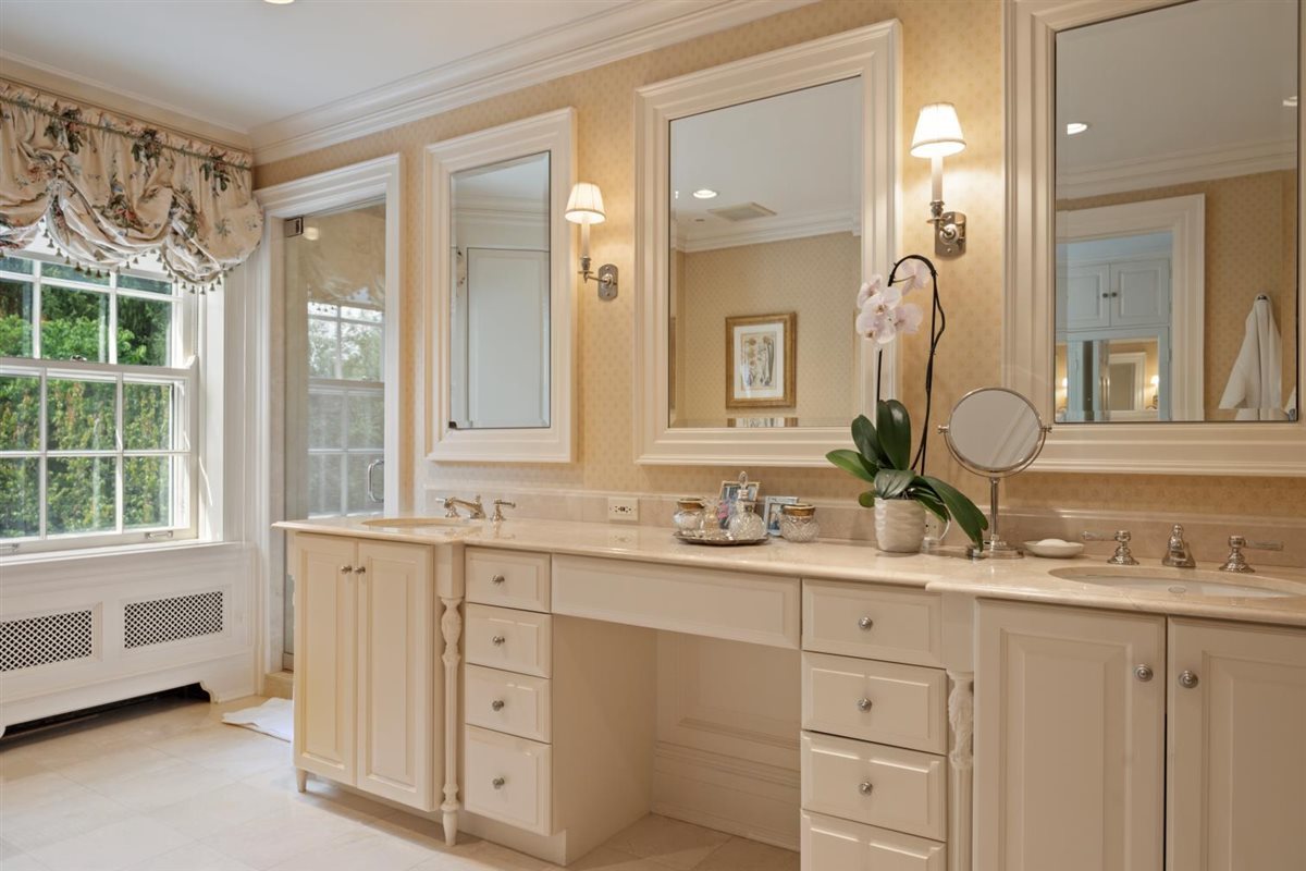 5 Woodley Road Winnetka, IL 60093 - Photo 33 of 48 a bathroom with a granite countertop sink mirror and double