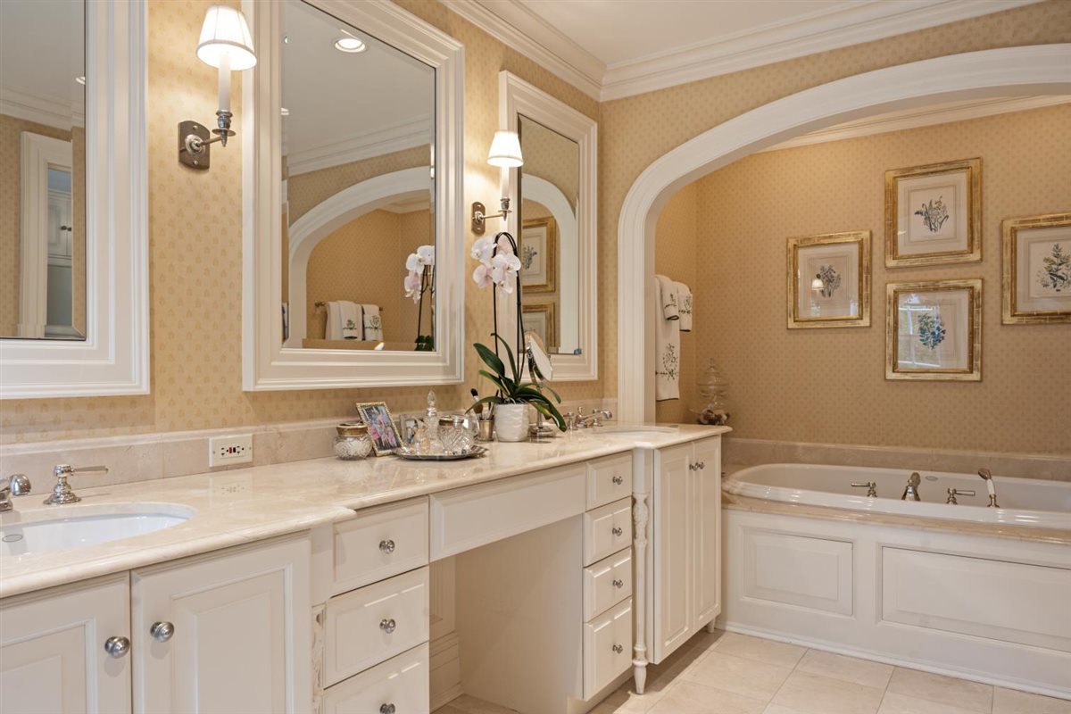 5 Woodley Road Winnetka, IL 60093 - Photo 34 of 48 a bathroom with a double vanity sink mirror and double