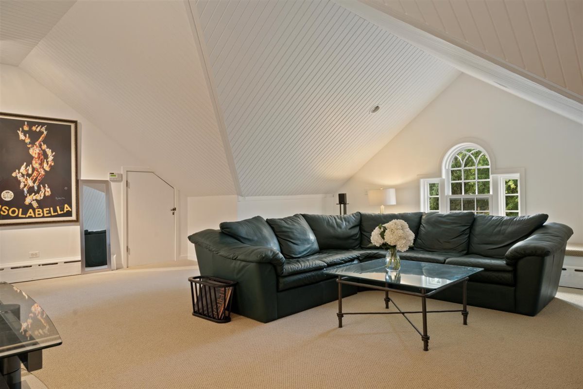 5 Woodley Road Winnetka, IL 60093 - Photo 39 of 48 a living room with furniture and a window