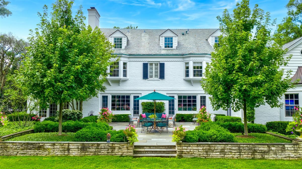 5 Woodley Road Winnetka, IL 60093 - Photo 43 of 48 a front view of a house with a yard