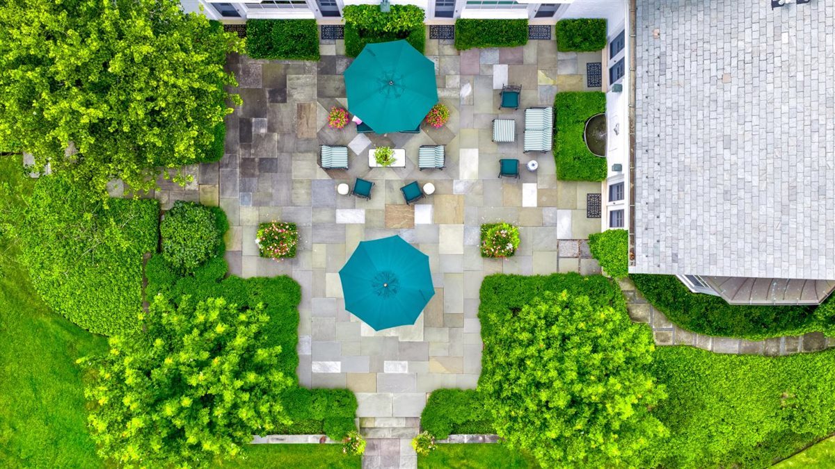 5 Woodley Road Winnetka, IL 60093 - Photo 44 of 48 an aerial view of a house with a yard and a large tree