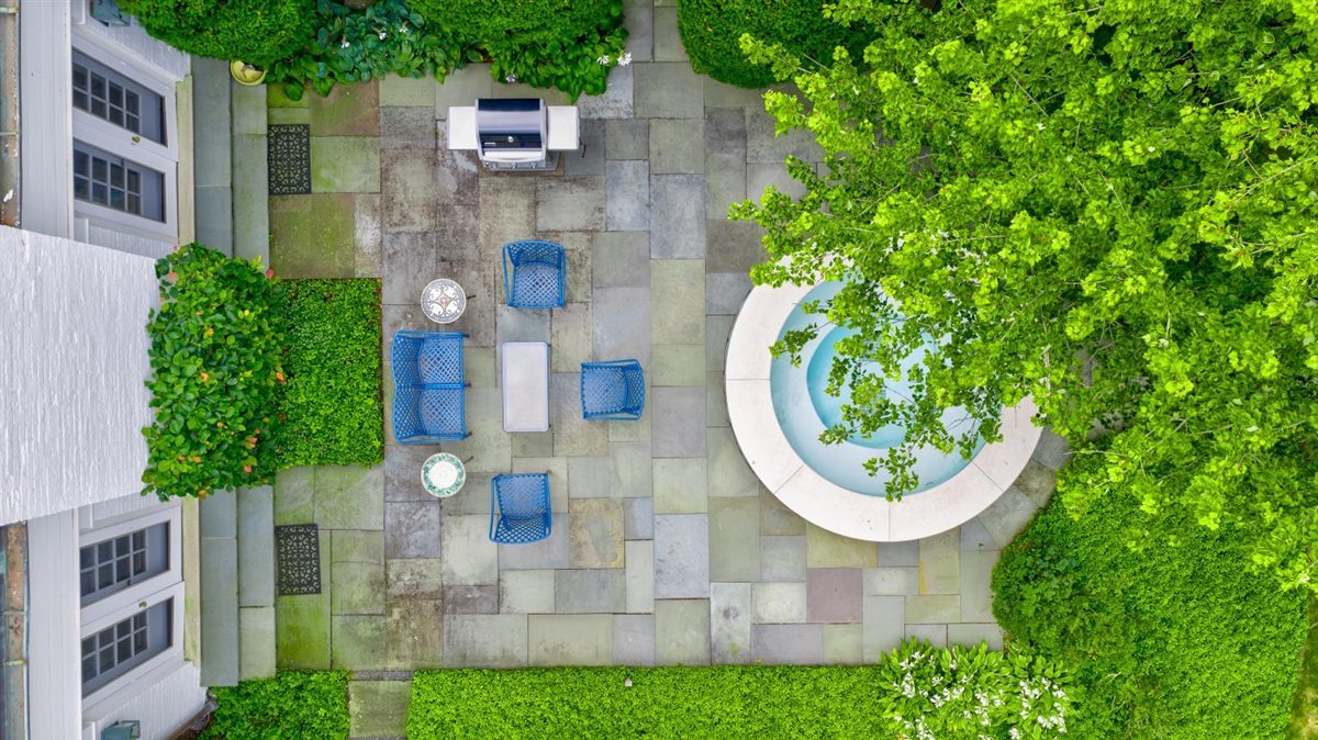 5 Woodley Road Winnetka, IL 60093 - Photo 45 of 48 an aerial view of a house with a garden and plants