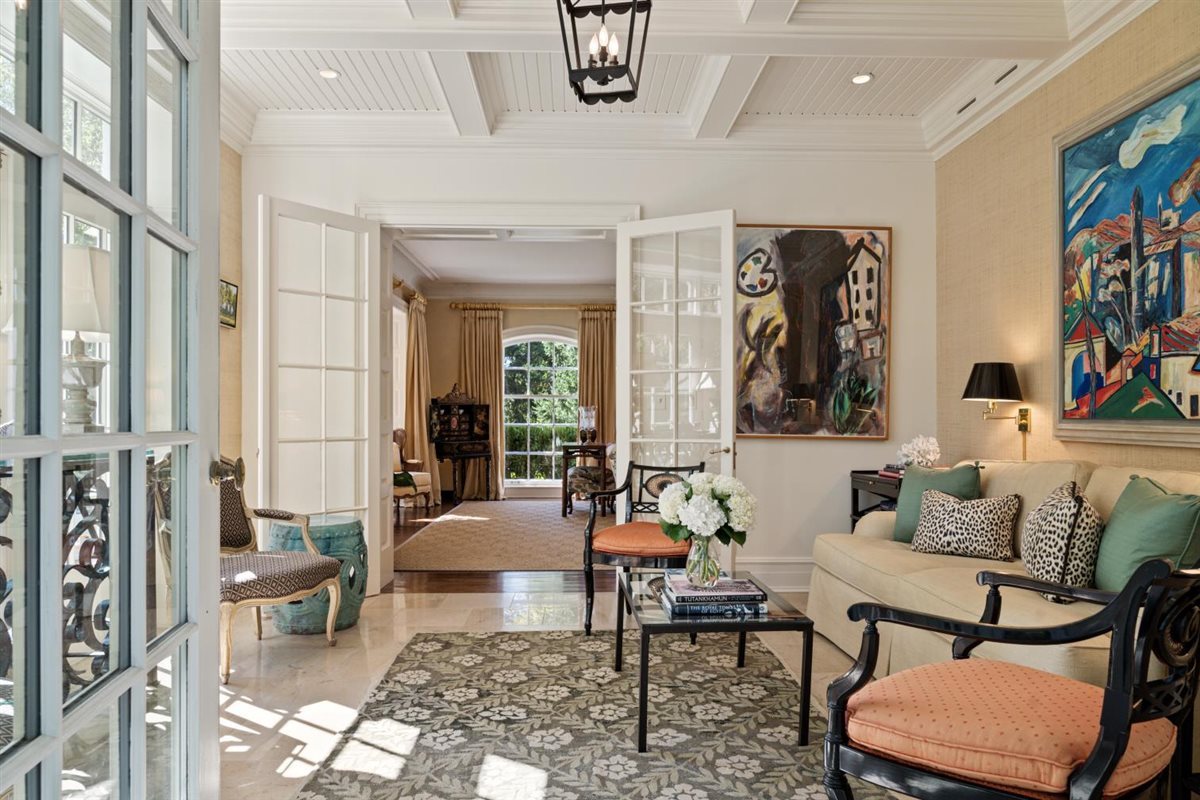 5 Woodley Road Winnetka, IL 60093 - Photo 8 of 48 a living room with furniture and a potted plant