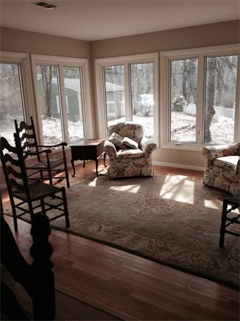 301 Marked Tree Road Needham, MA 02492 - Photo 11 of 19 a living room with furniture and large windows