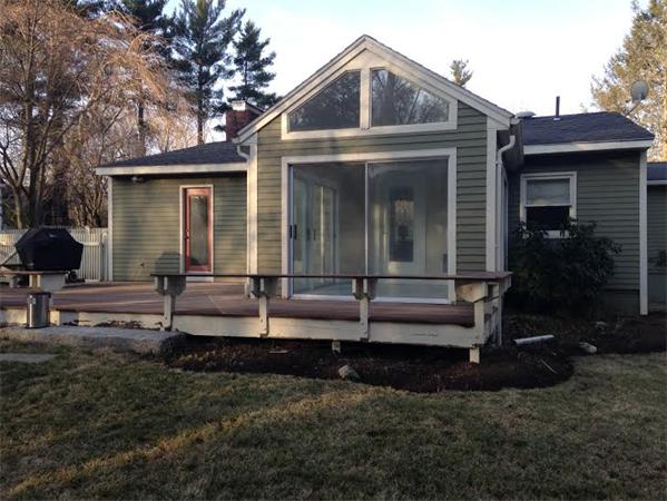 301 Marked Tree Road Needham, MA 02492 - Photo 18 of 19 a front view of a house with a yard