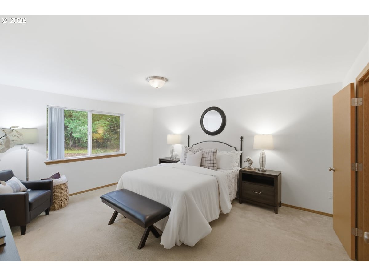 37905 South Wilhoit Road Molalla, OR 97038 - Photo 11 of 48 a bedroom with a bed window and a table