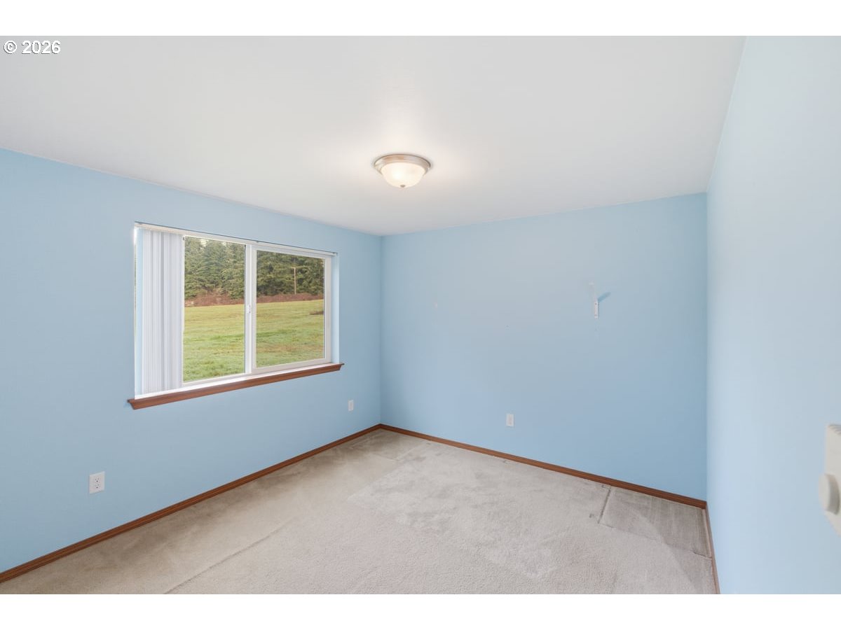 37905 South Wilhoit Road Molalla, OR 97038 - Photo 17 of 48 a view of an empty room with a window