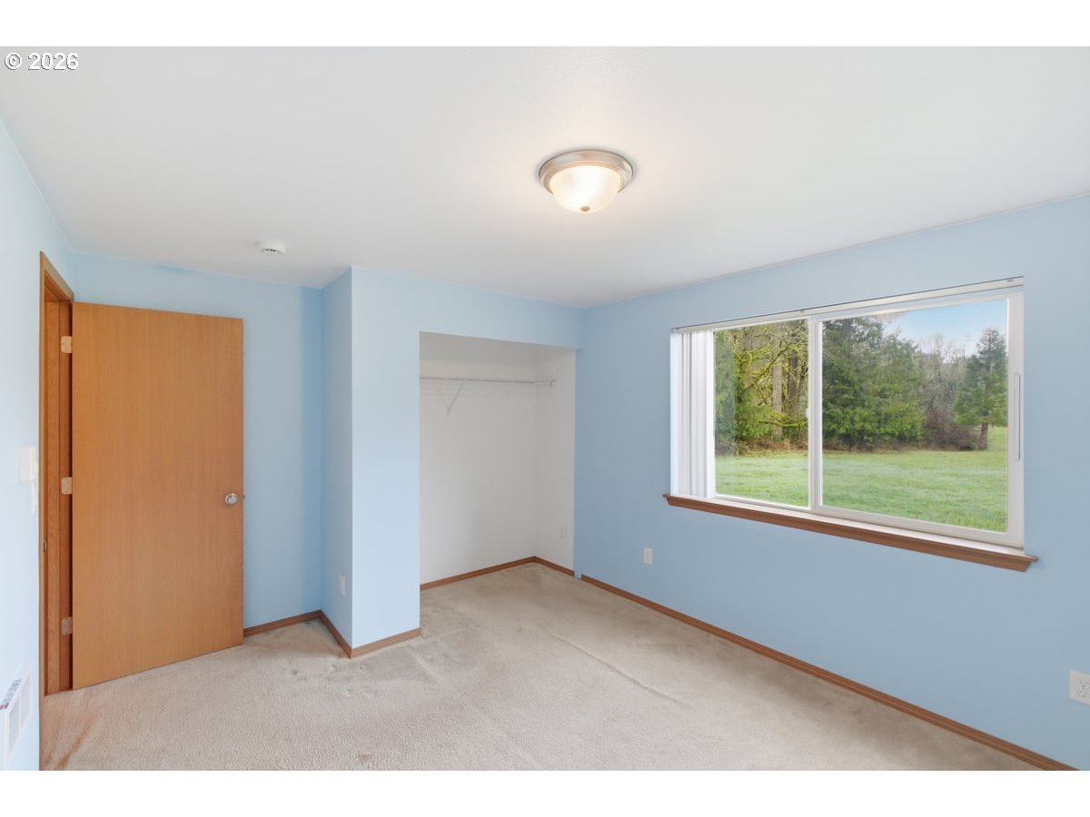 37905 South Wilhoit Road Molalla, OR 97038 - Photo 18 of 48 a view of an empty room with a window