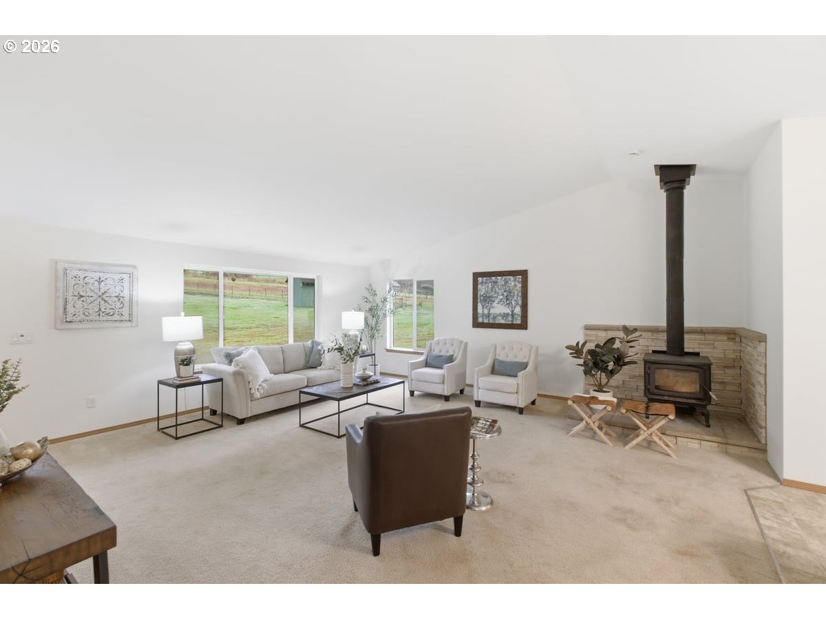 37905 South Wilhoit Road Molalla, OR 97038 - Photo 2 of 48 a living room with furniture and a large window