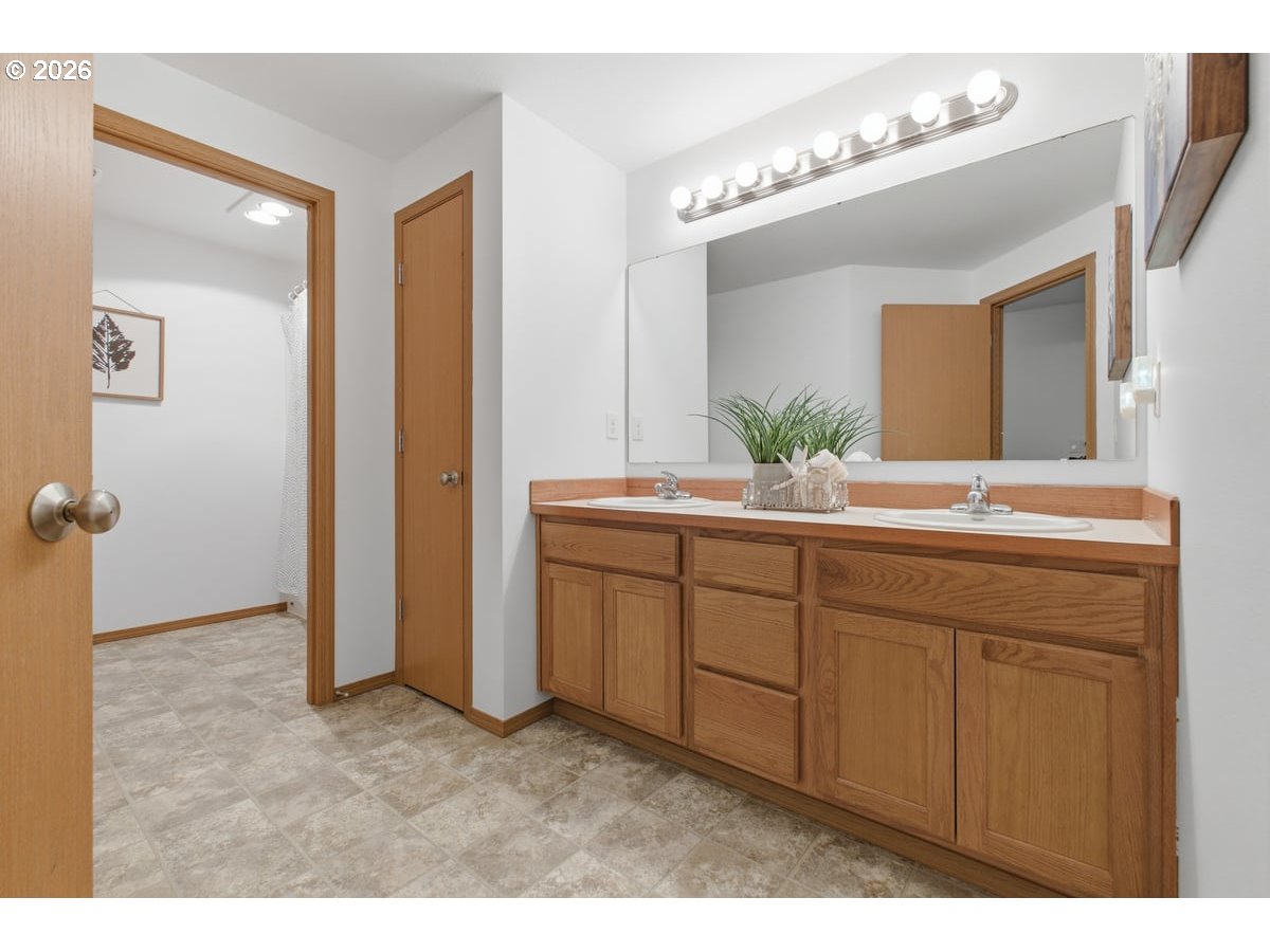 37905 South Wilhoit Road Molalla, OR 97038 - Photo 26 of 48 a bathroom with a sink and a mirror
