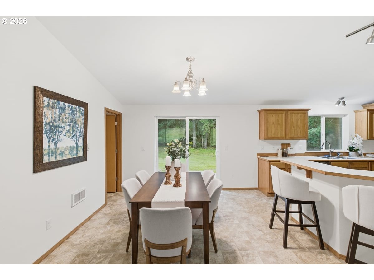 37905 South Wilhoit Road Molalla, OR 97038 - Photo 9 of 48 a view of a dining room with furniture window and outside view
