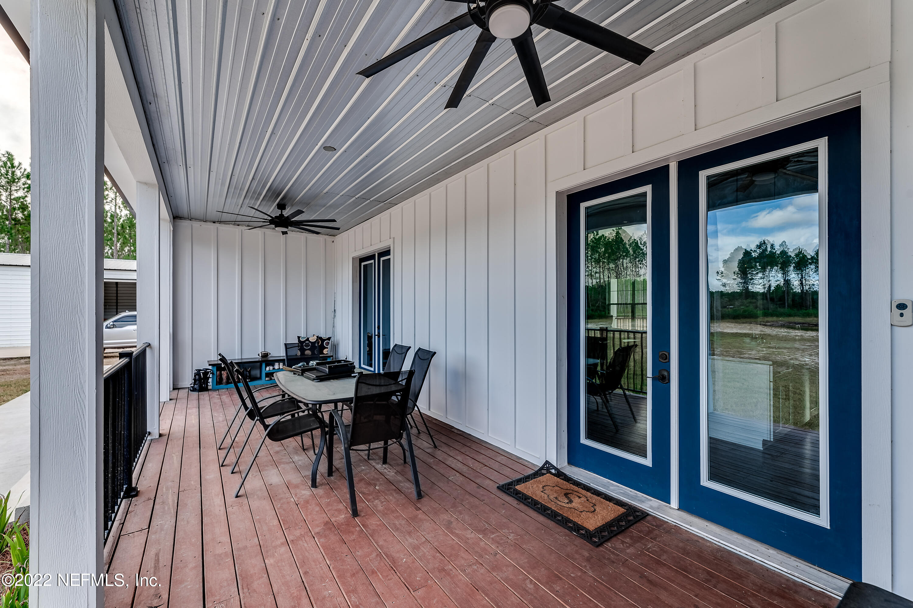 343 Higdon Road Jacksonville, FL 32234 - Photo 16 of 67 a dining room with furniture and wooden floor