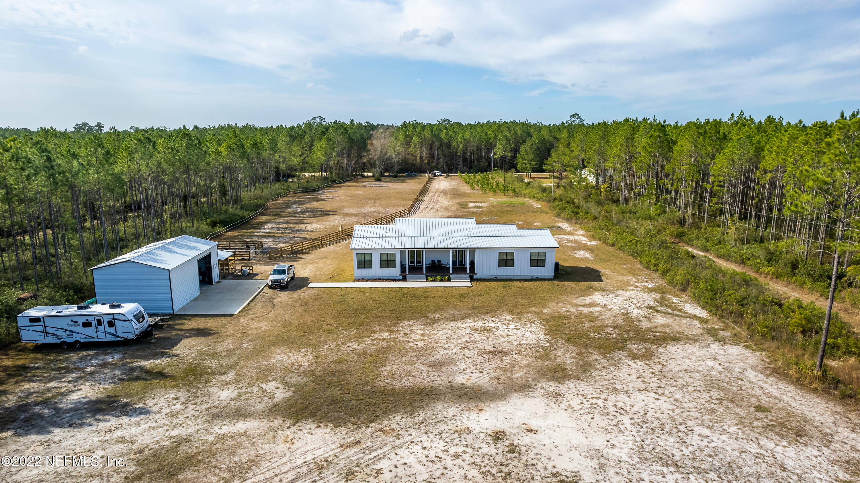 343 Higdon Road Jacksonville, FL 32234 - Photo 54 of 67 a view of a house with a yard and balcony