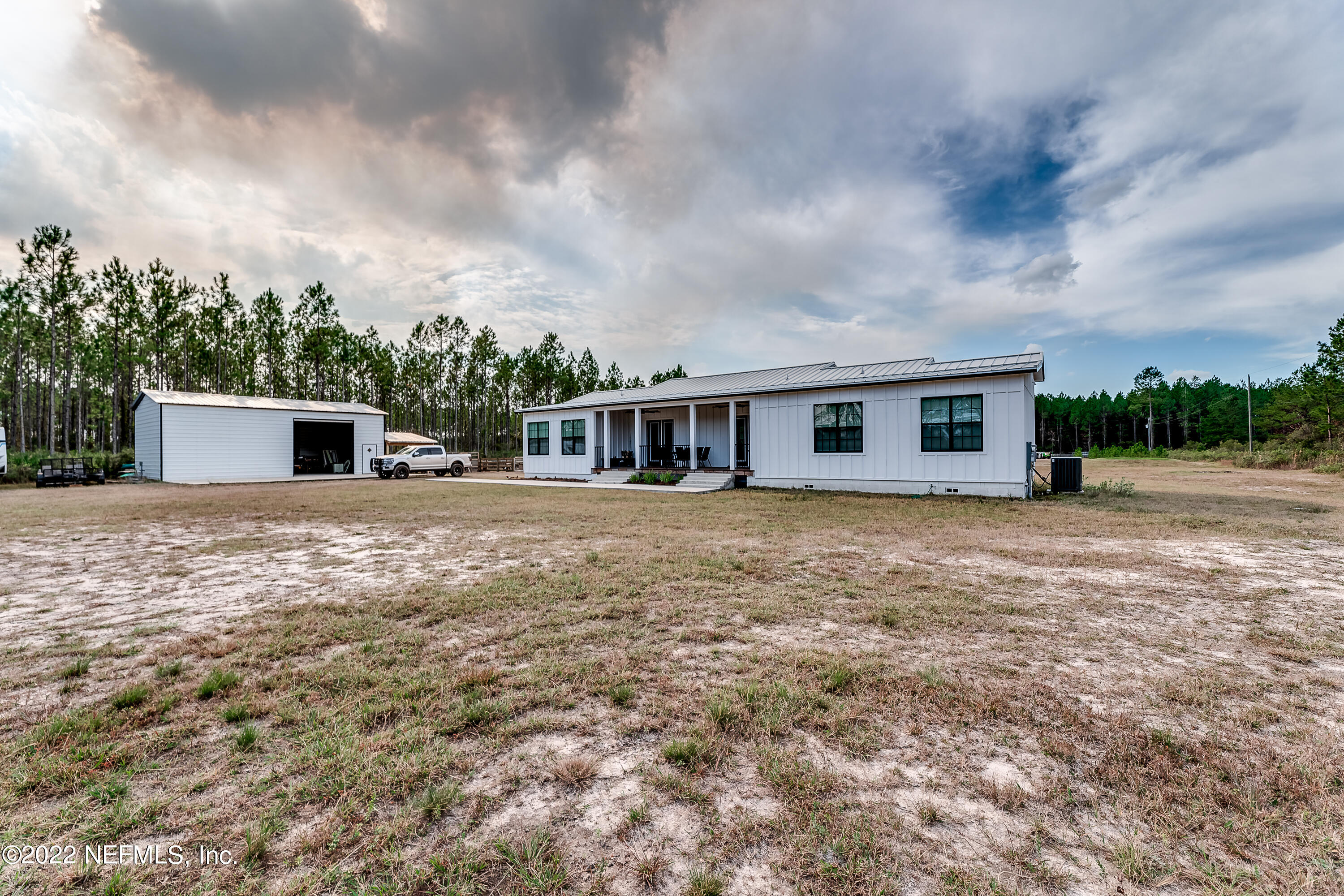 343 Higdon Road Jacksonville, FL 32234 - Photo 8 of 67 a front view of a house with a yard