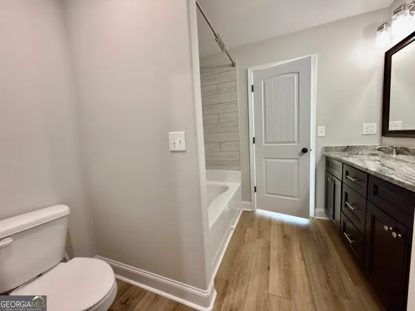 a bathroom with a sink and a toilet