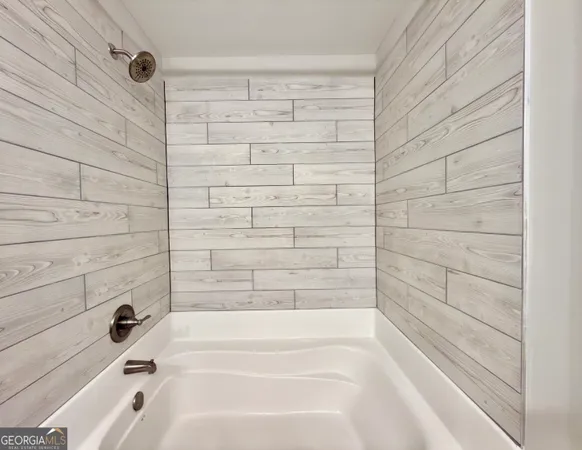a bathroom with a bathtub