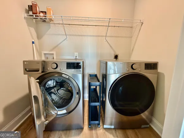 a utility room with dryer and washer