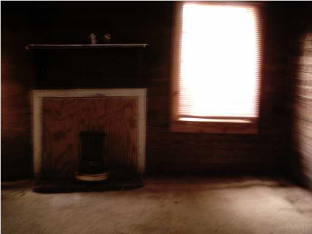 9116 Pleasant Home Road Holt, FL 32564 - Photo 5 of 5 Bedroom in cabin.