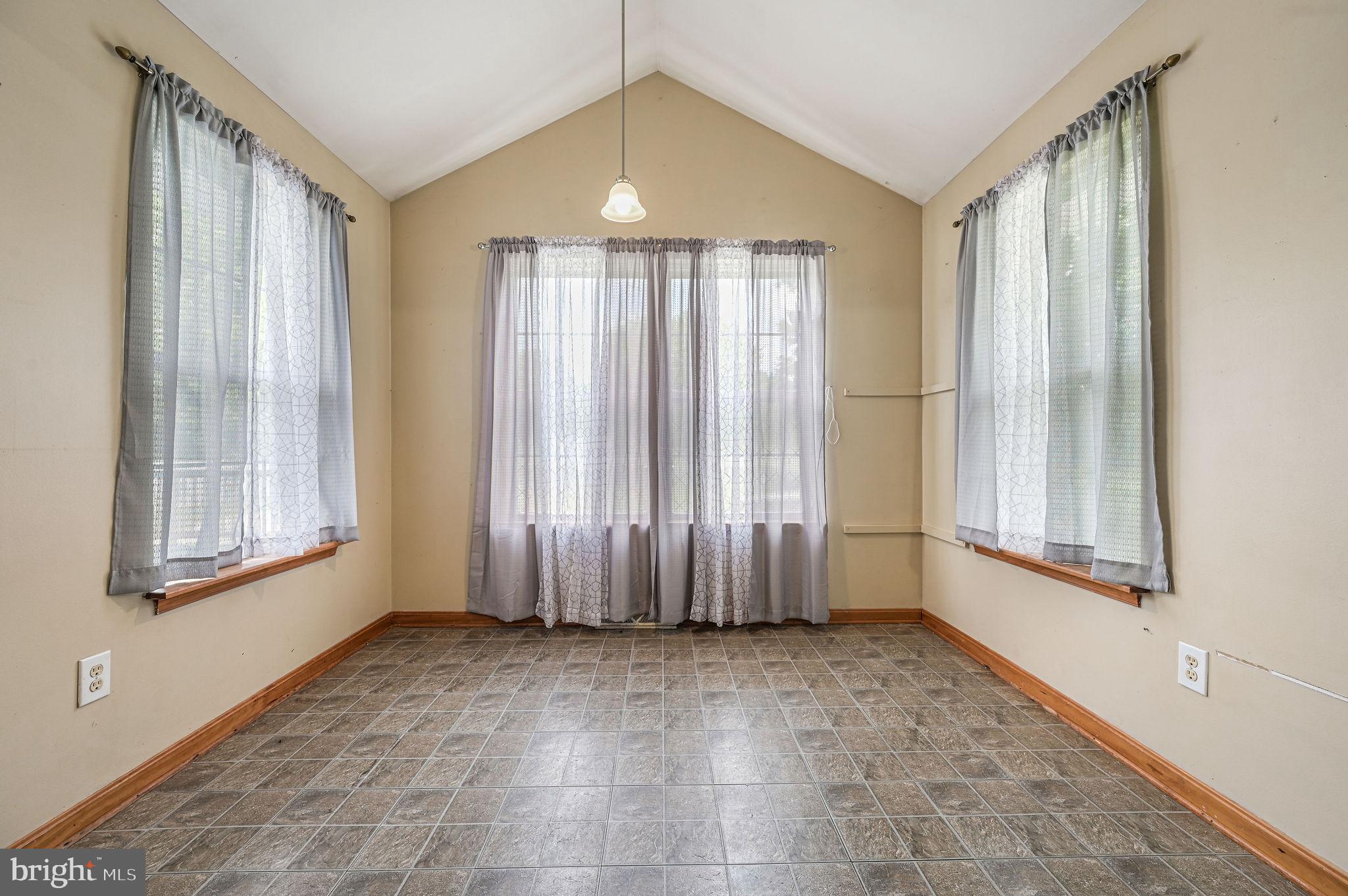 113 Fieldbrook Drive Magnolia, DE 19962 - Photo 14 of 38 an empty room with windows
