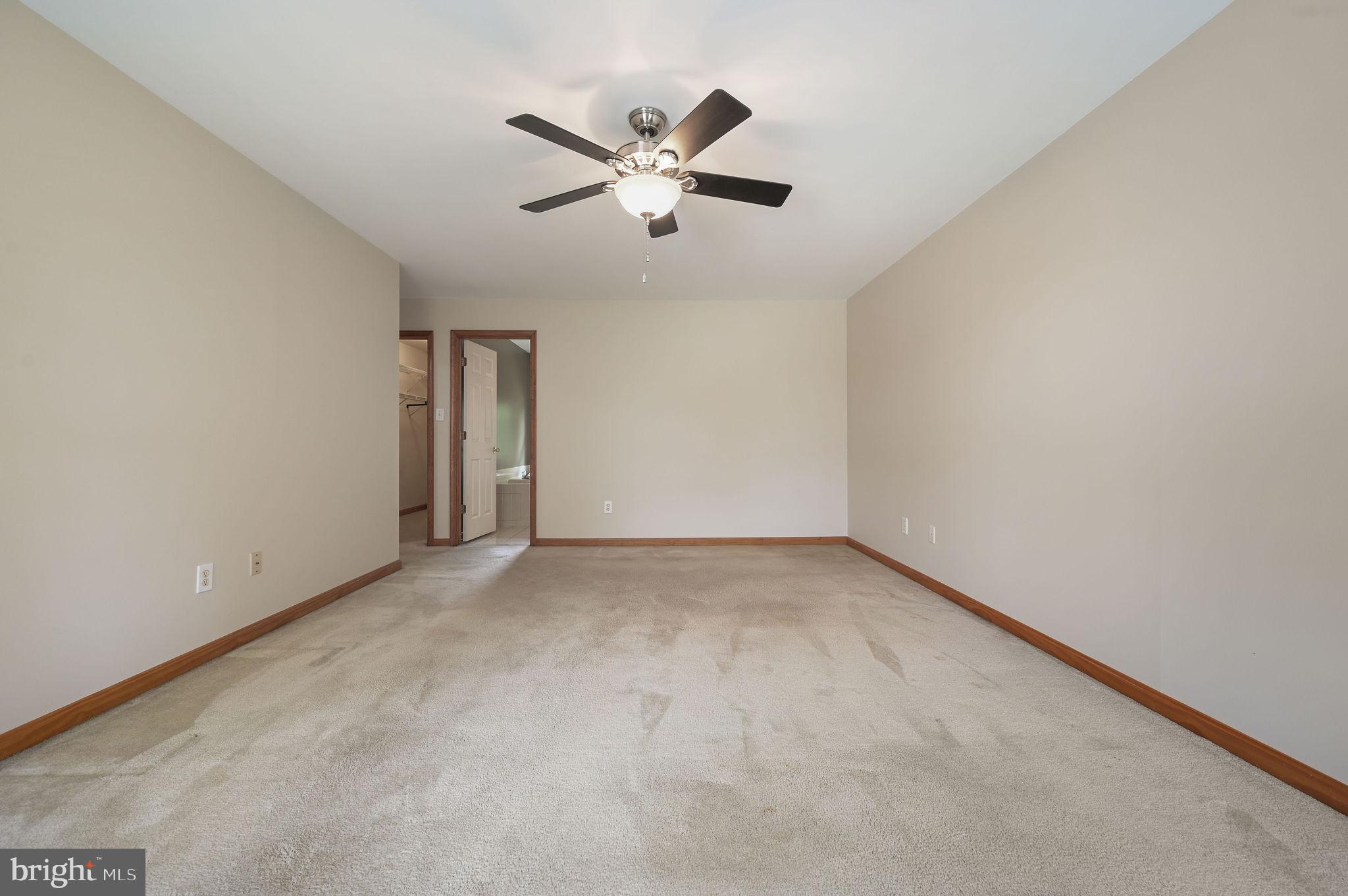 113 Fieldbrook Drive Magnolia, DE 19962 - Photo 24 of 38 an empty room with ceiling fan and window
