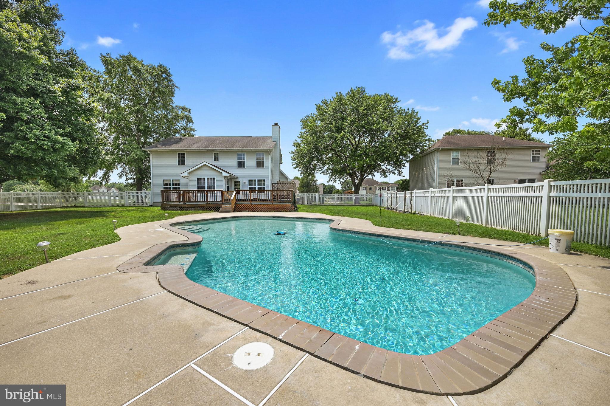 113 Fieldbrook Drive Magnolia, DE 19962 - Photo 4 of 38 a view of a swimming pool with a patio
