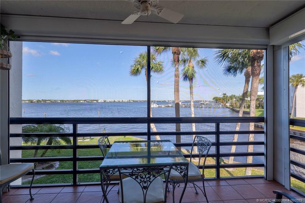 1950 Southwest Palm City Road, Unit 14207 Stuart, FL 34994 - Photo 47 of 50 a view of a chairs and table in patio