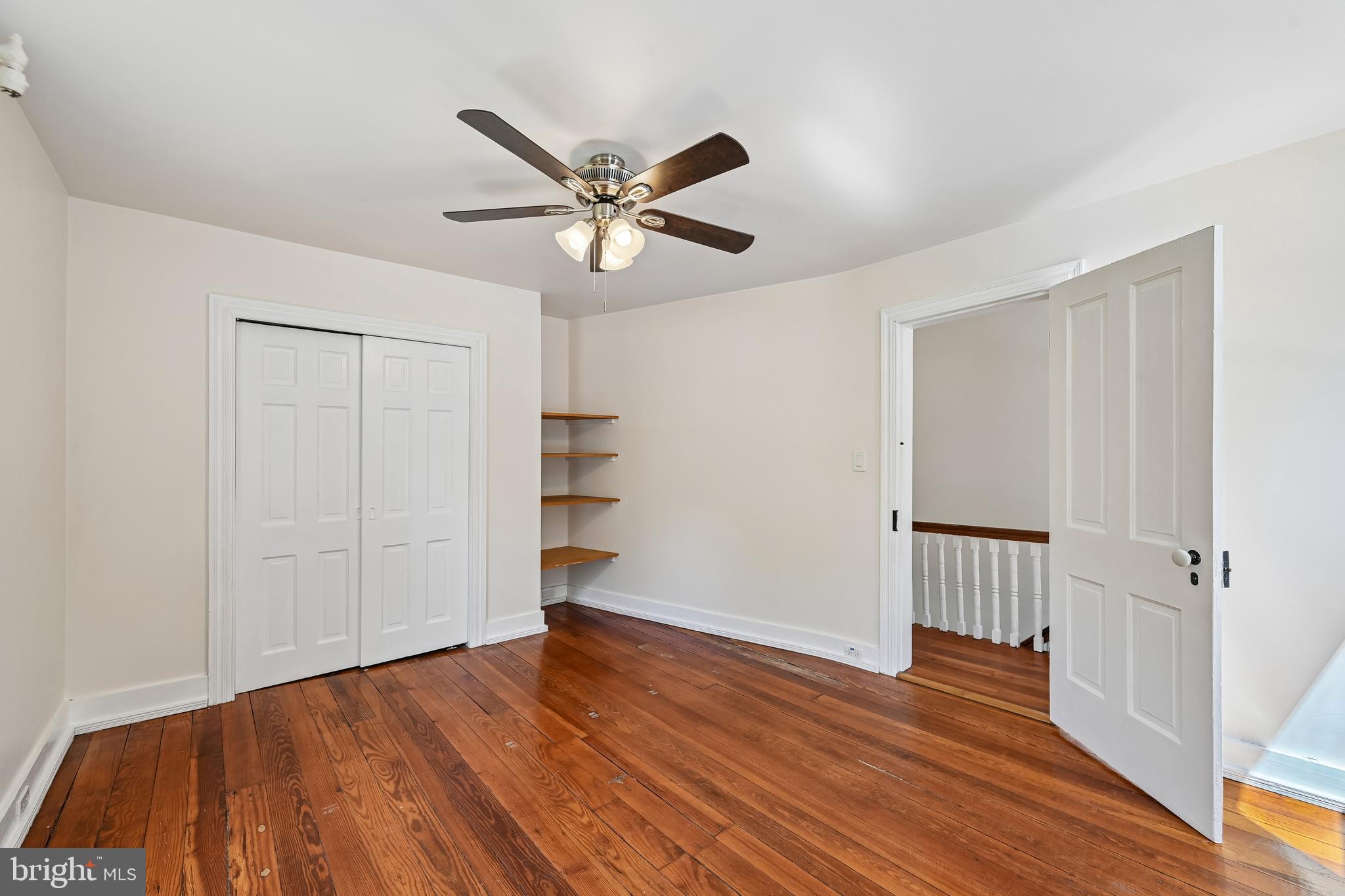 5702 Falls Road Baltimore, MD 21209 - Photo 24 of 49 a view of empty room with wooden floor