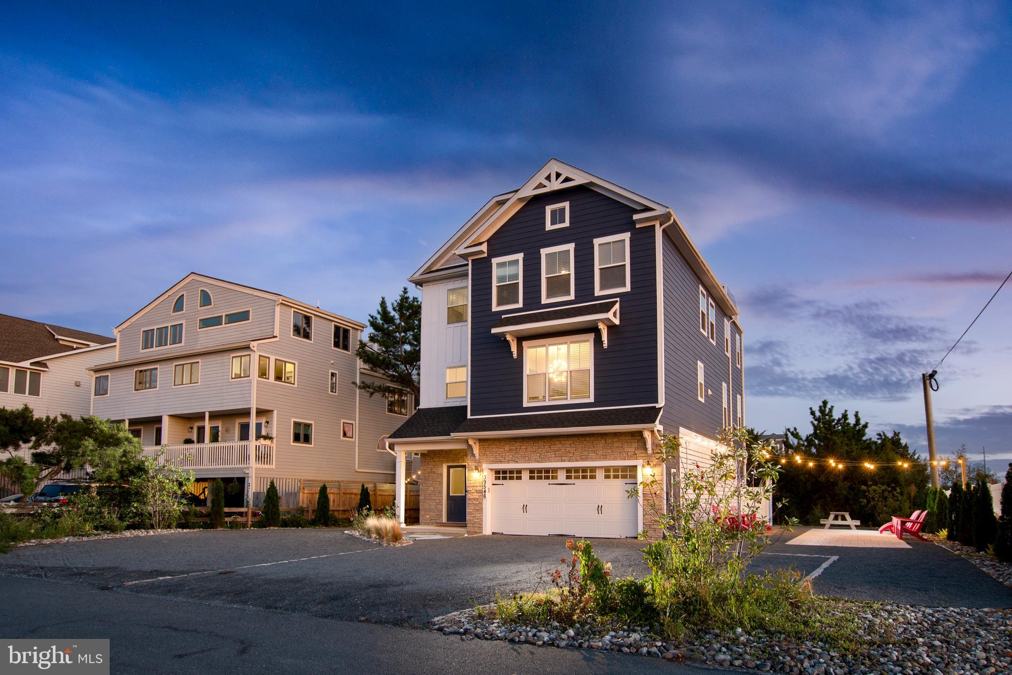 39546 Admiral Road Bethany Beach, DE 19930 - Photo 1 of 73 a front view of a house with a yard