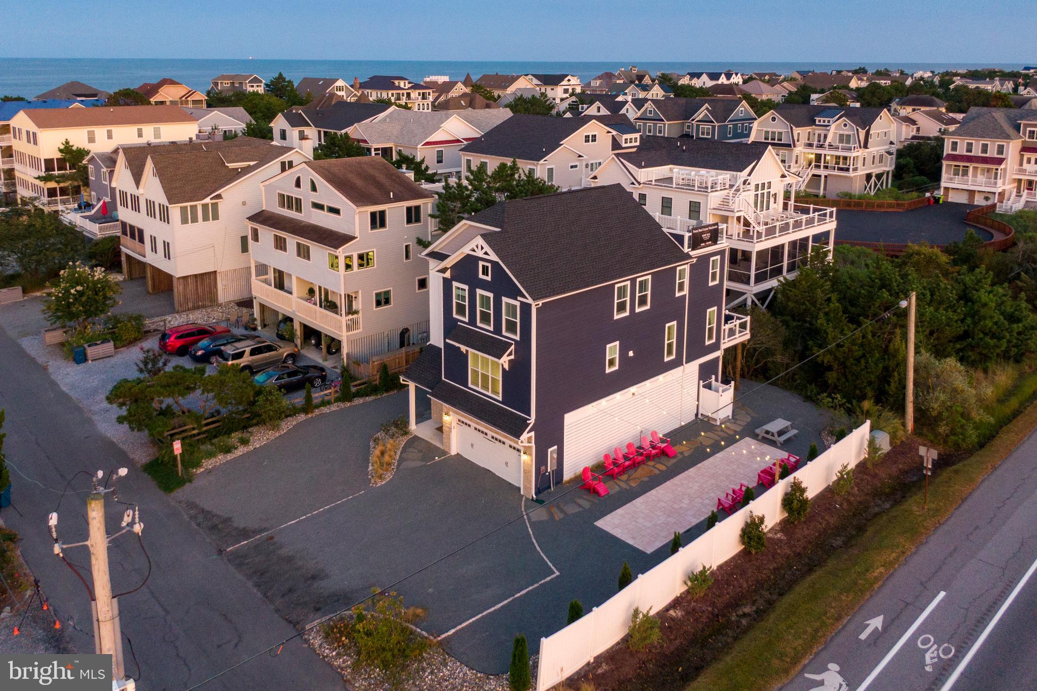 39546 Admiral Road Bethany Beach, DE 19930 - Photo 4 of 73 an aerial view of residential houses with outdoor space