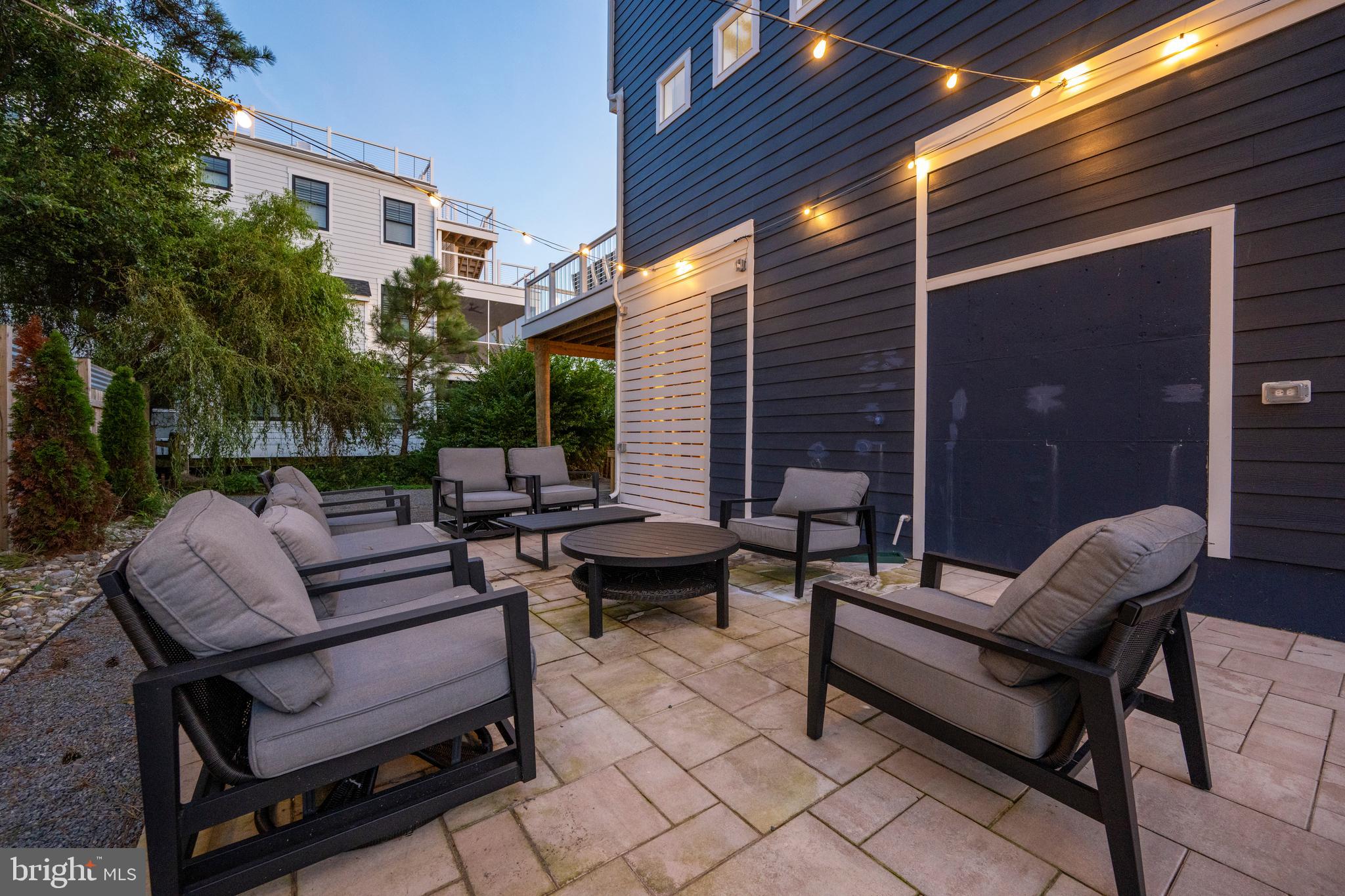 39546 Admiral Road Bethany Beach, DE 19930 - Photo 46 of 73 a patio view with patio couches and a potted plant