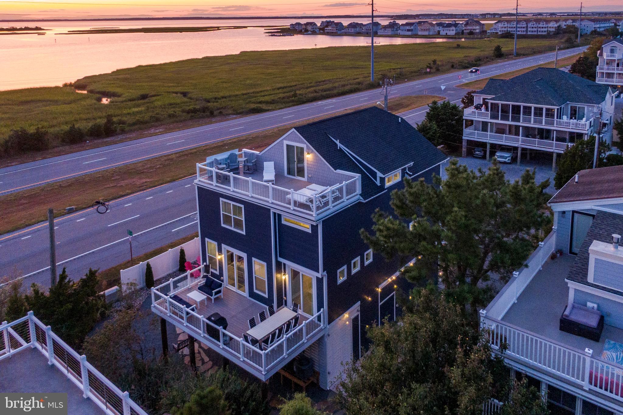 39546 Admiral Road Bethany Beach, DE 19930 - Photo 49 of 73 an aerial view of a house with a big yard