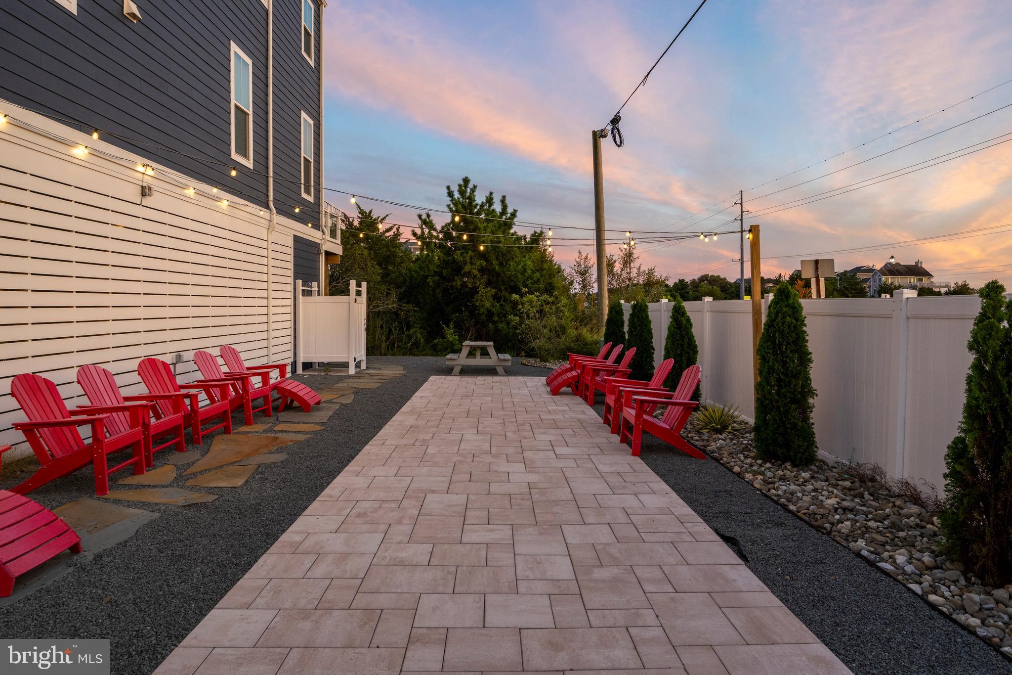 39546 Admiral Road Bethany Beach, DE 19930 - Photo 50 of 73 a view of a terrace with sitting area